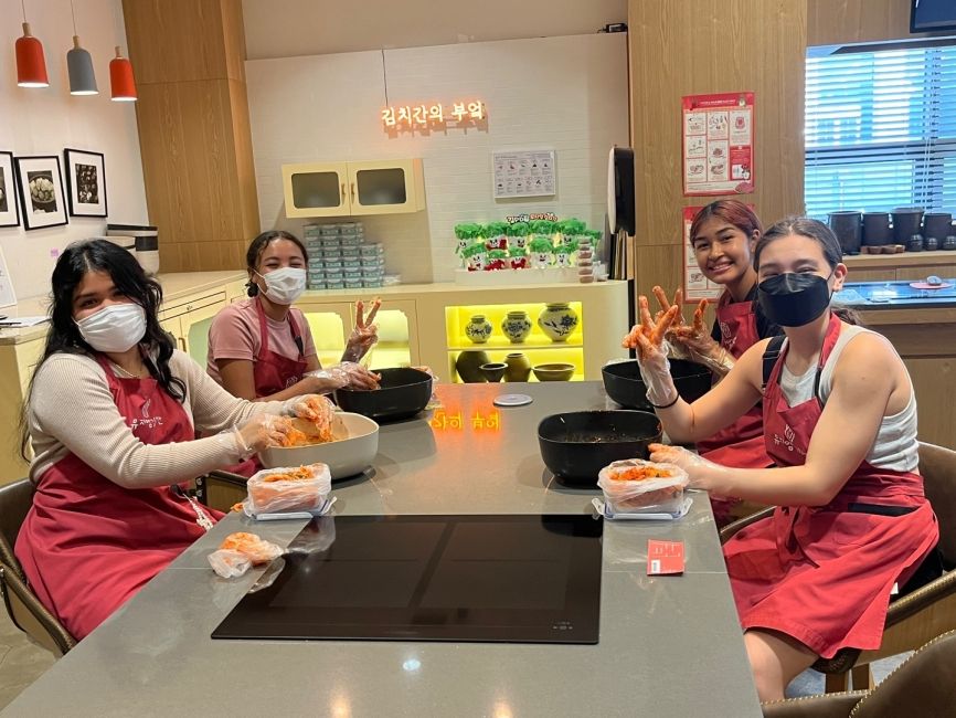 Students making kimchi