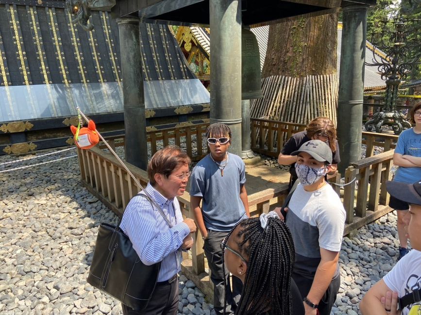 Tour guide giving an explanation about the shrine