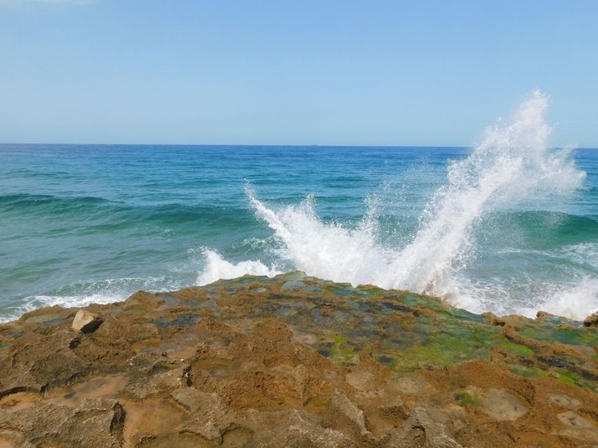 Waves crashing into rocks