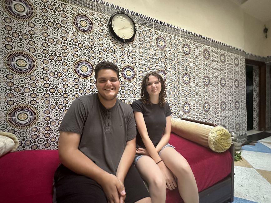 teens sitting in living room