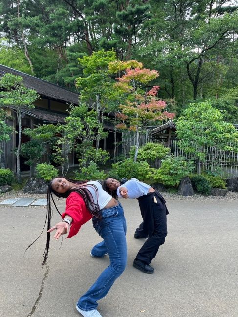 Taniya and Tiffanie doing a JoJo pose at Edo Wonderland in Nikko