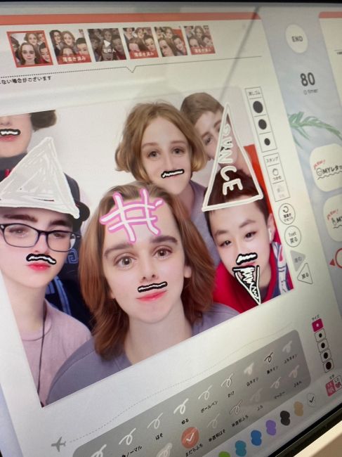 Rowan, Sahli, Aidan, Ben, Brett, and Isaac in Harajuku doing purikura