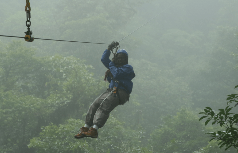 high school student ziplining in Costa Rica