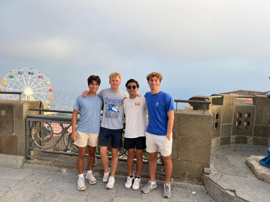 friends abroad sunset city overlook