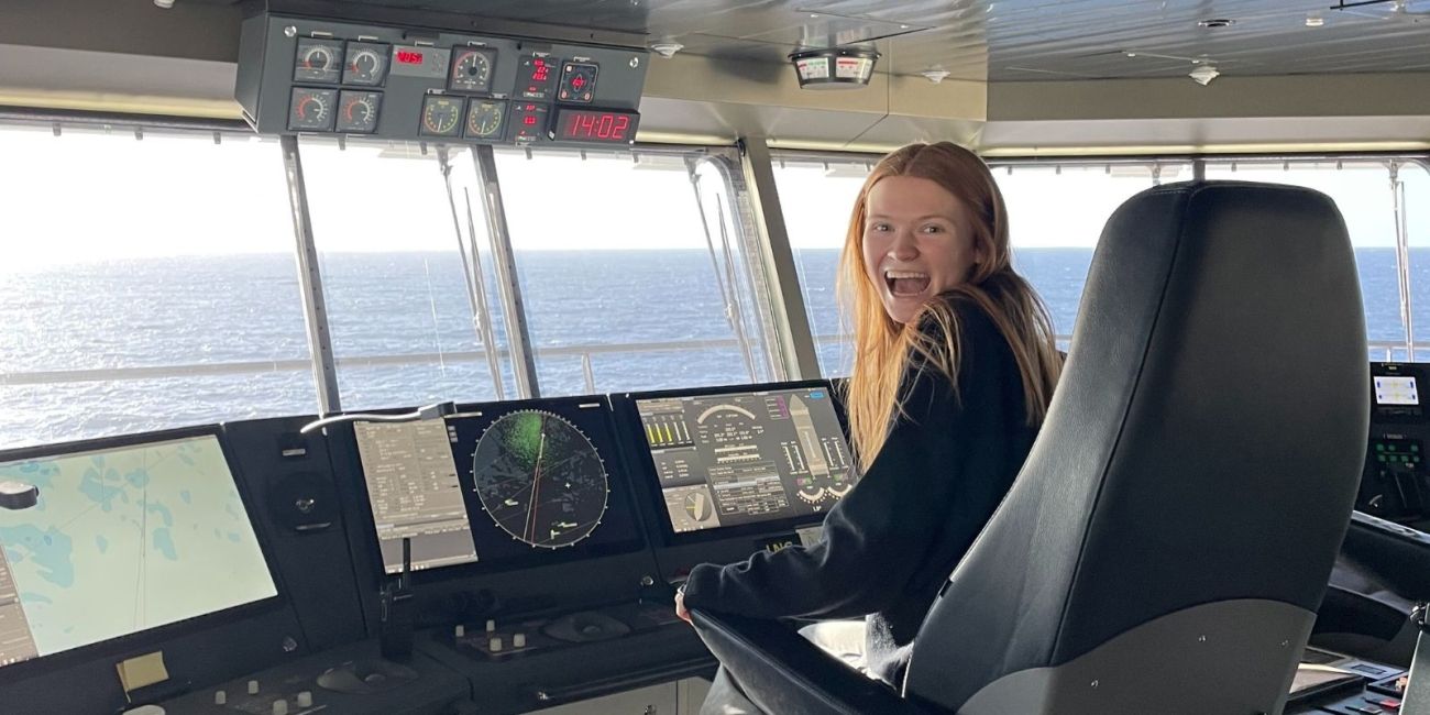 Student in the pilothouse of the ferry