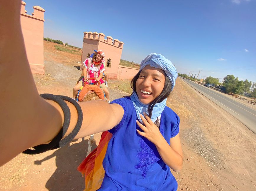 High school student in Morocco taking a self with her arm out