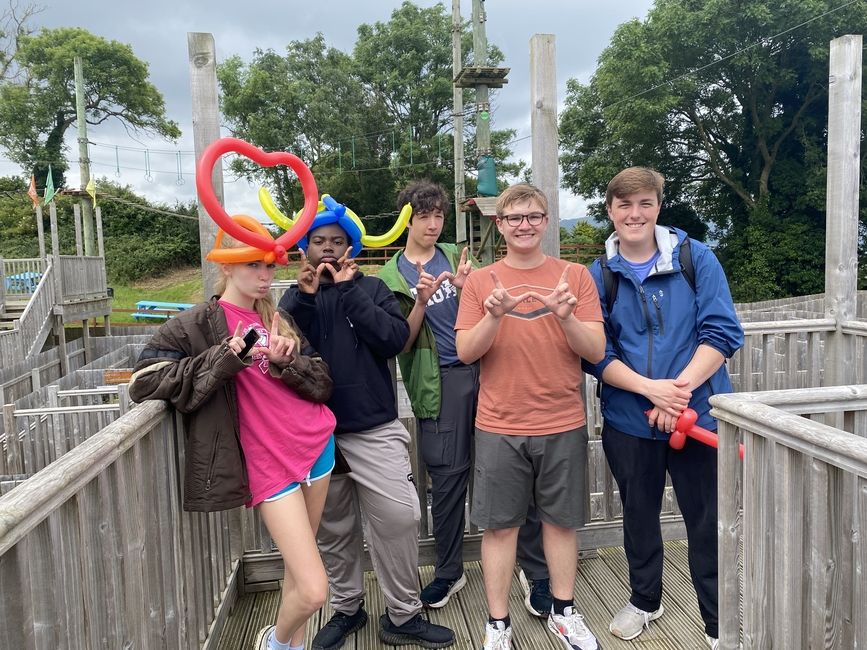 Students pose for a photo after completing the maze. 