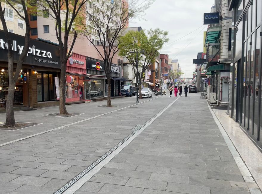 street view in pyeongtaek with building lined along it 