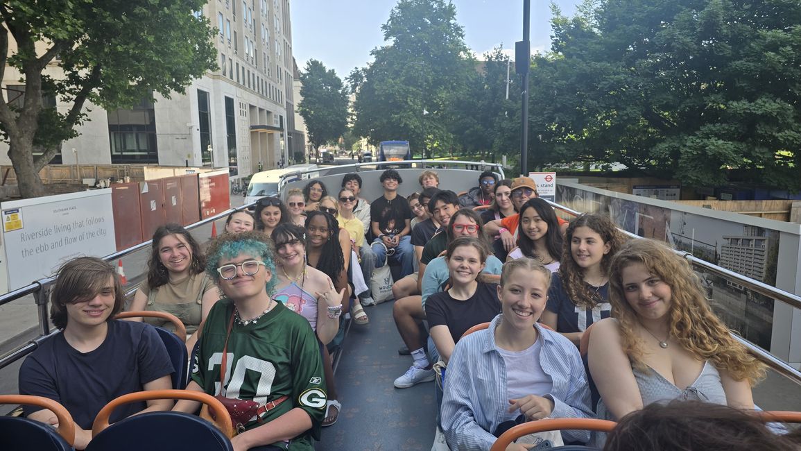 Students enjoying the double-decker bus tour