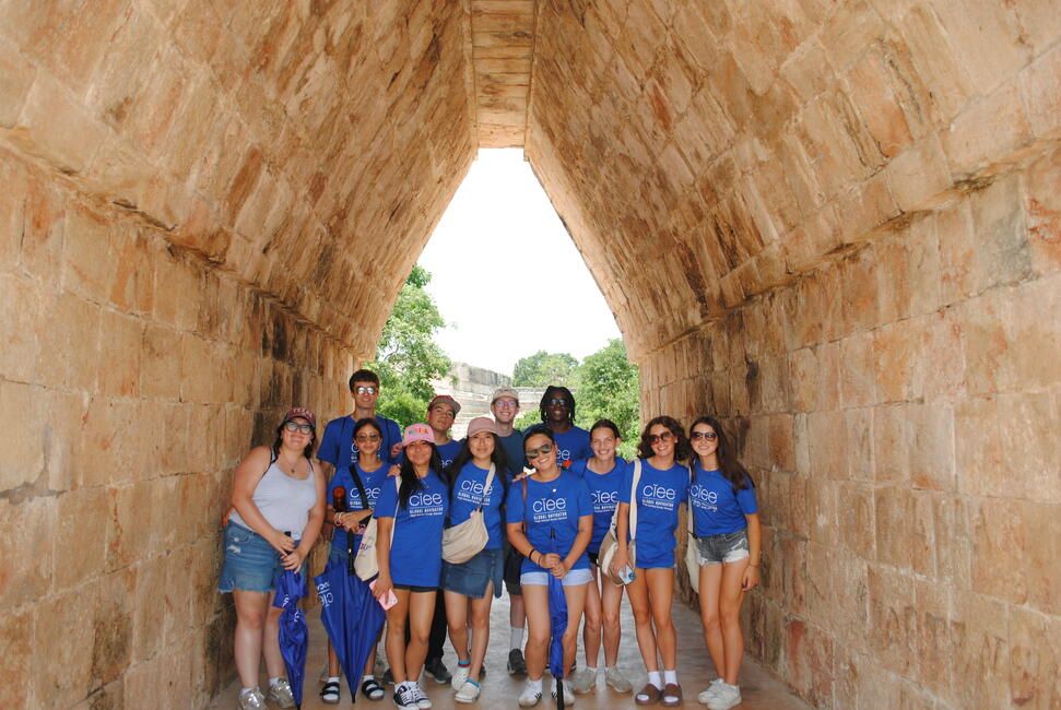 HSSA students stand in an ancient archway constructed by Mayans in the ancient city of Uxmal