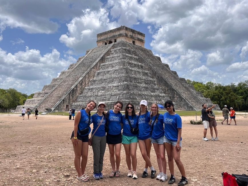Students standing in front of Chichen Itza (the main tower)