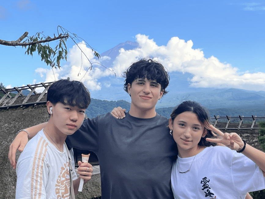 students posing in front of mt fuji