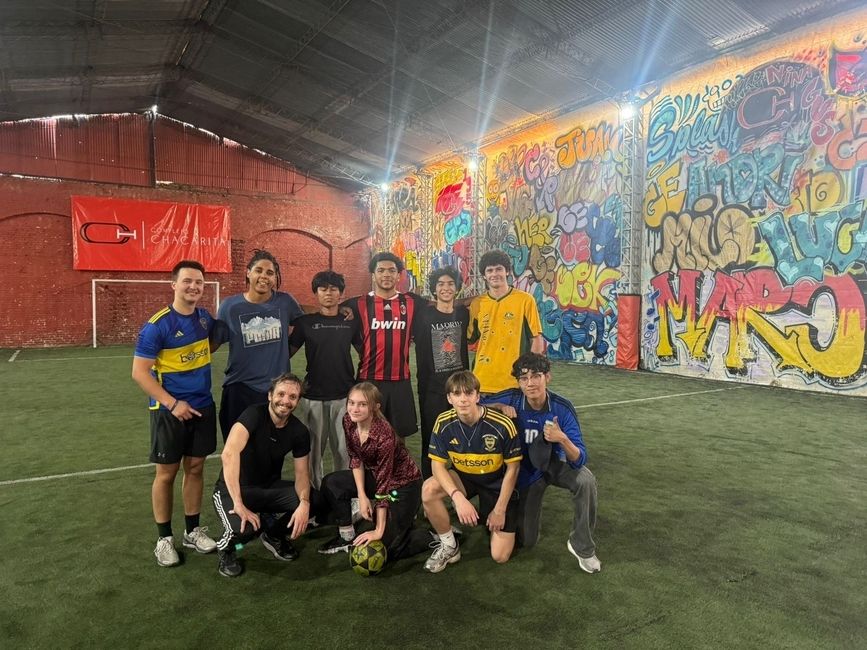 Global Navigators pose on the soccer pitch after an afternoon of scrimmaging.