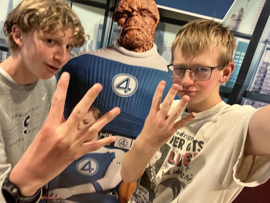 posing in front of fantastic 4 set