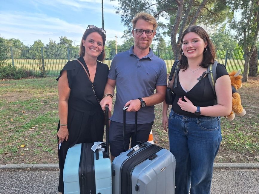 A couple meets their international exchange student for the first time