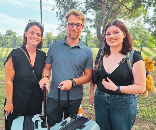 A couple meets their international exchange student for the first time