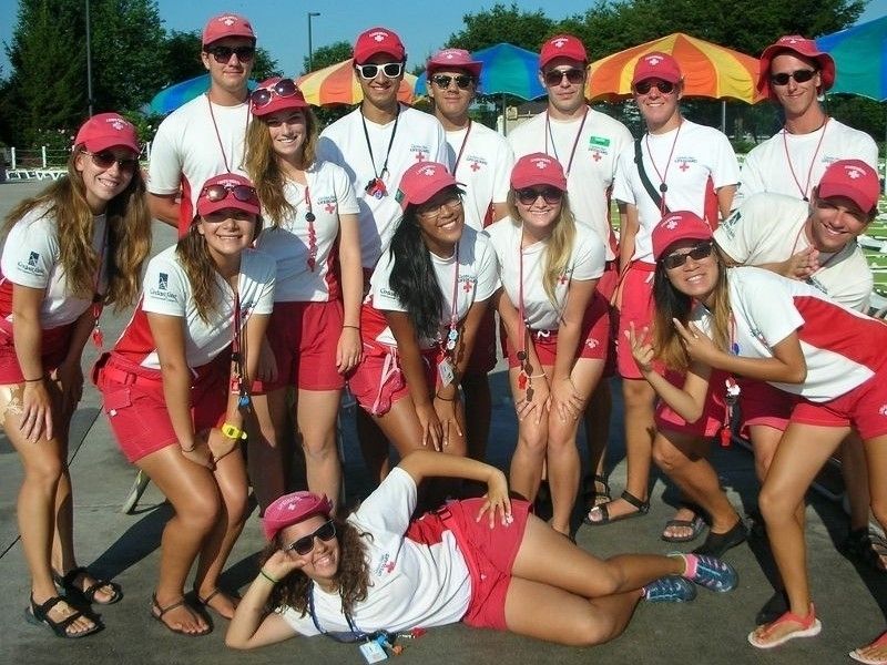 Lifeguards from a Six Flags park pose for a photo.