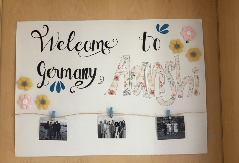 A welcome sign hangs in Aanshi's room.
