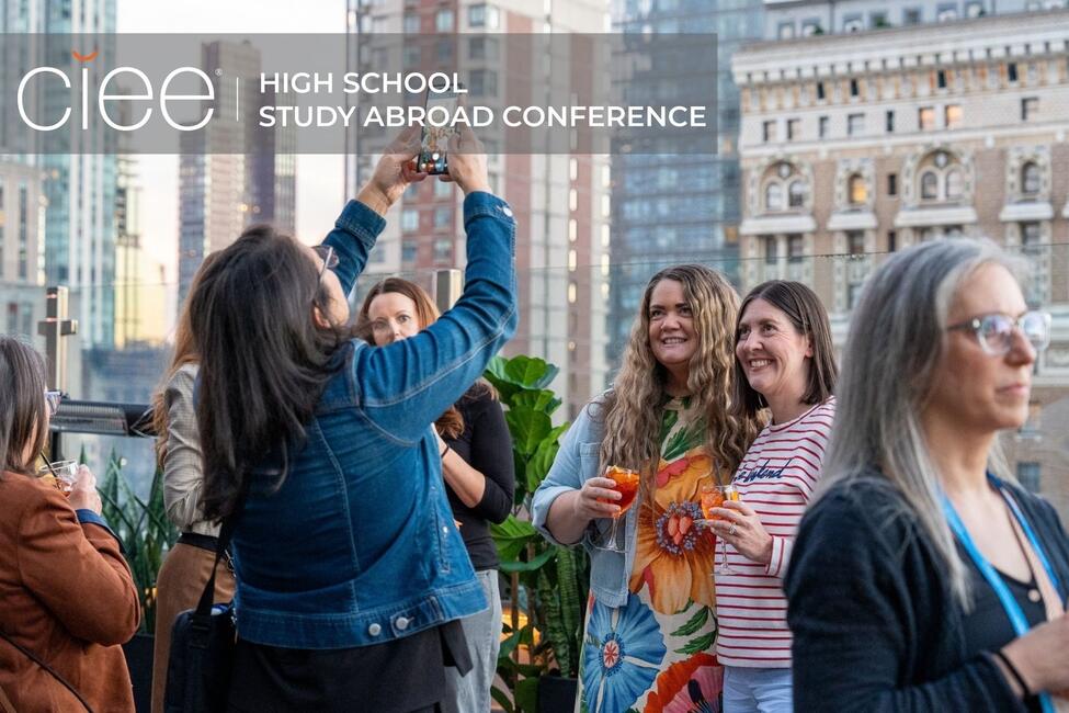 educators taking picture at rooftop reception