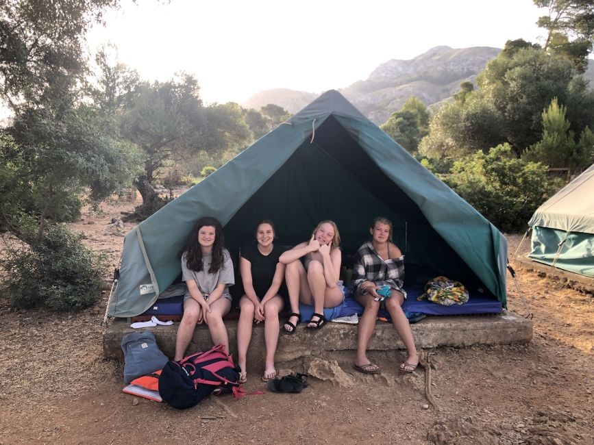 High school students in tent while camping in Palma de Mallorca