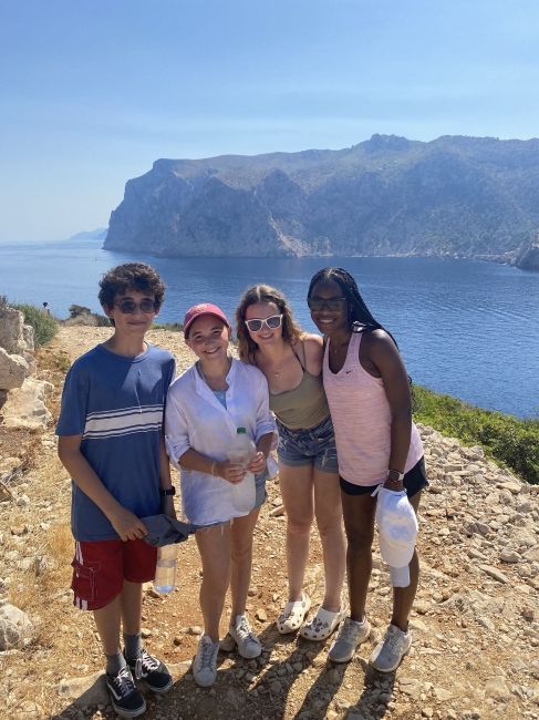 High school students on a cliff in Palma by the beach