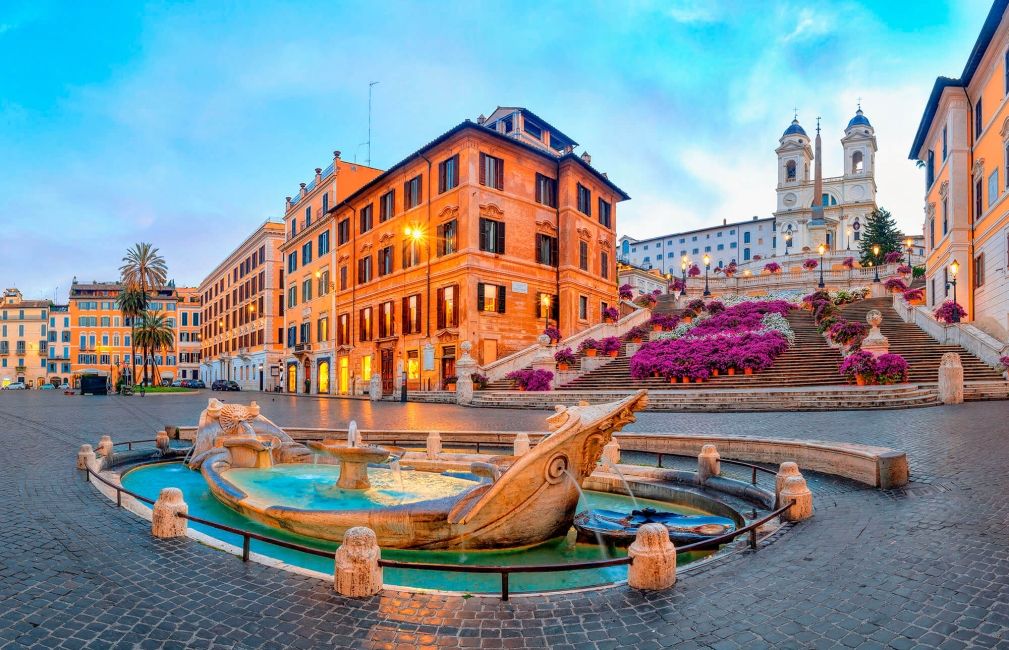 spanish steps downtown rome with fountain