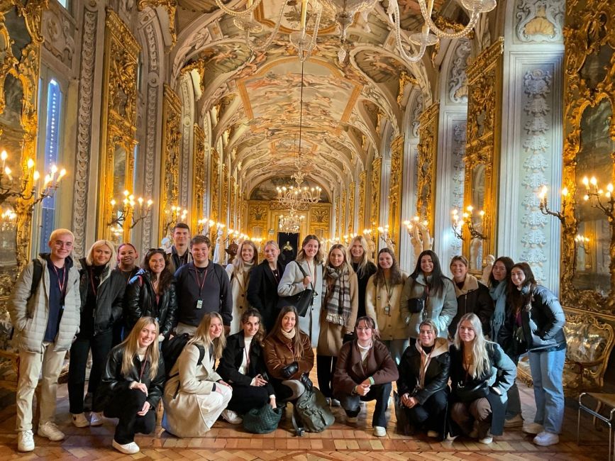 Tour group in hall of mirrors in Rome