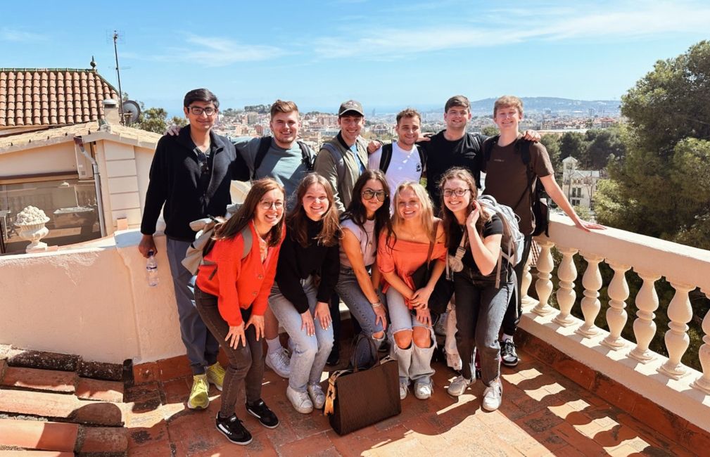 fall study abroad student group at top of barcelona hill