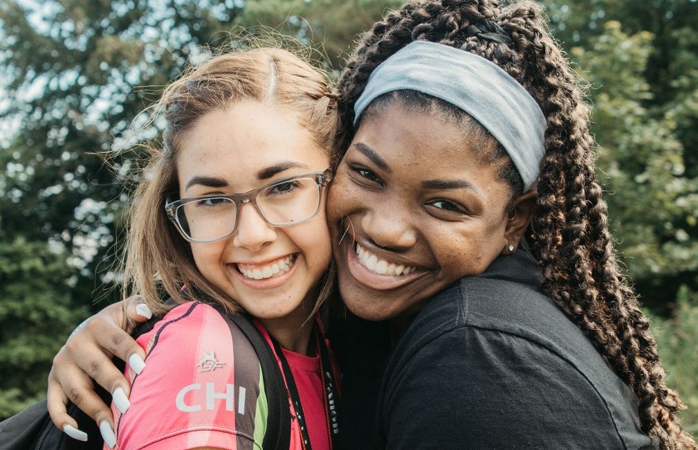 female frederick douglass fellows smile together