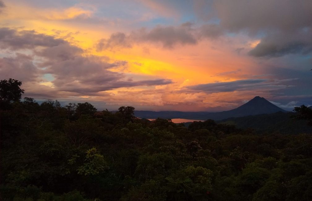 sunset in costa rica forest mountains