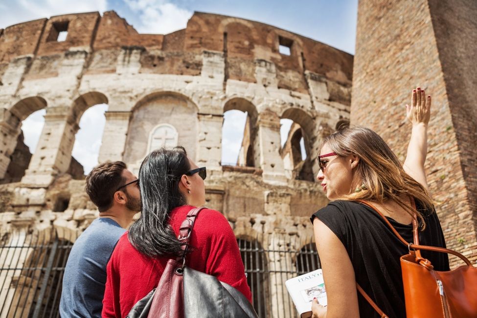 rome colosseum group looking up