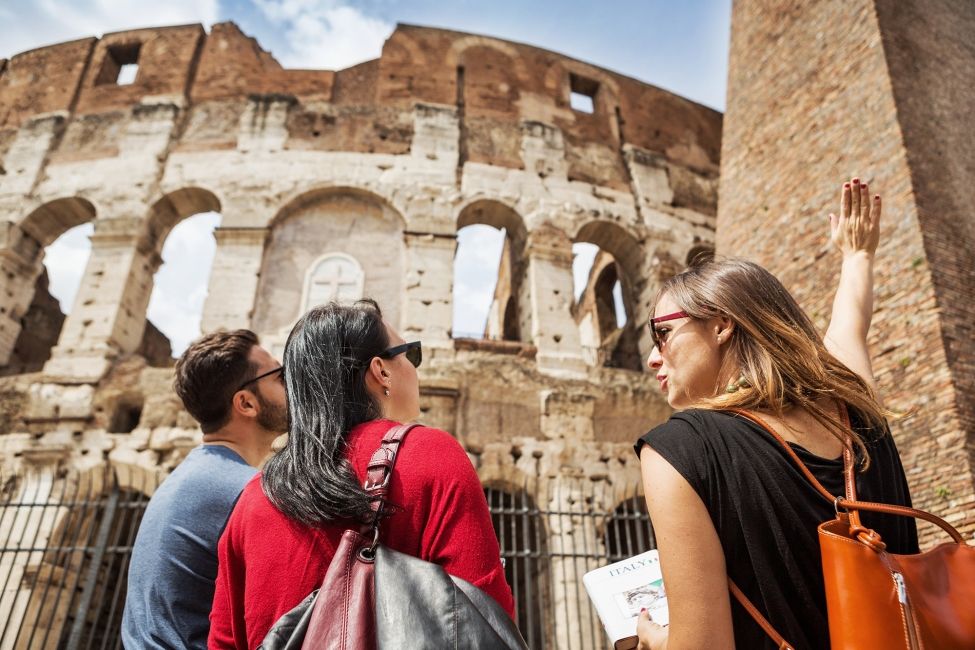 rome colosseum group looking up