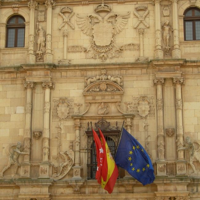 alcala building flags flying