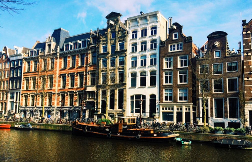 amsterdam row houses canal abroad