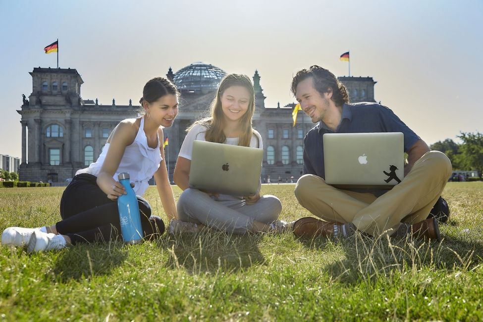 students berlin laptop lawn