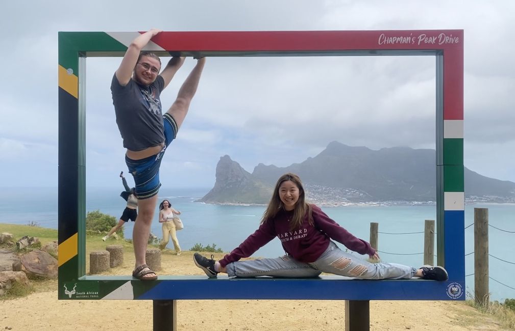 cape town students pose with south africa sign ocean