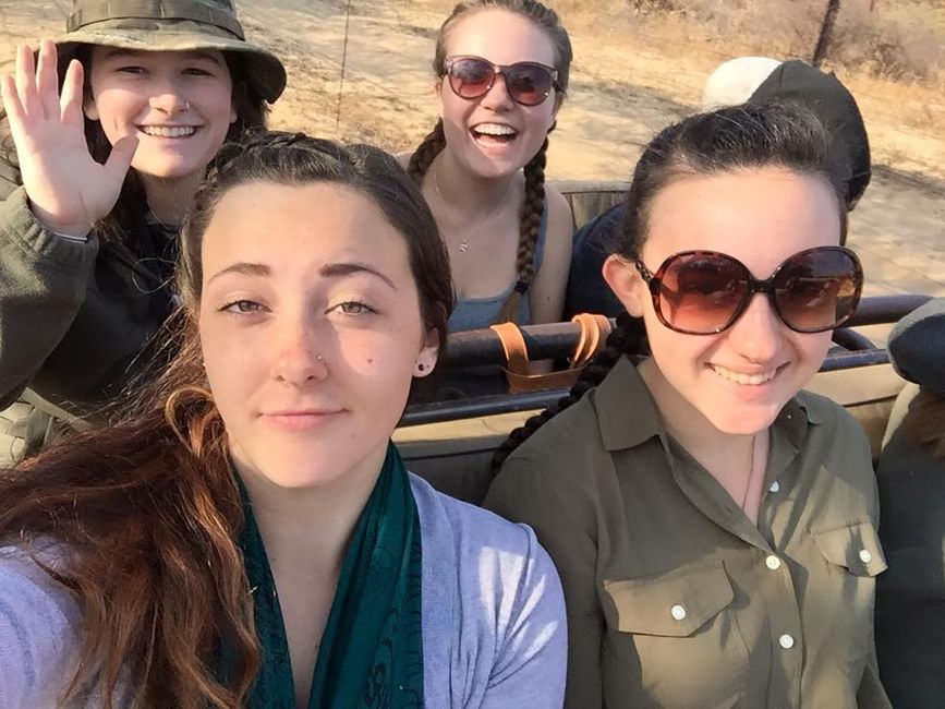 High school girls taking a selfie on a safari in Gaborone