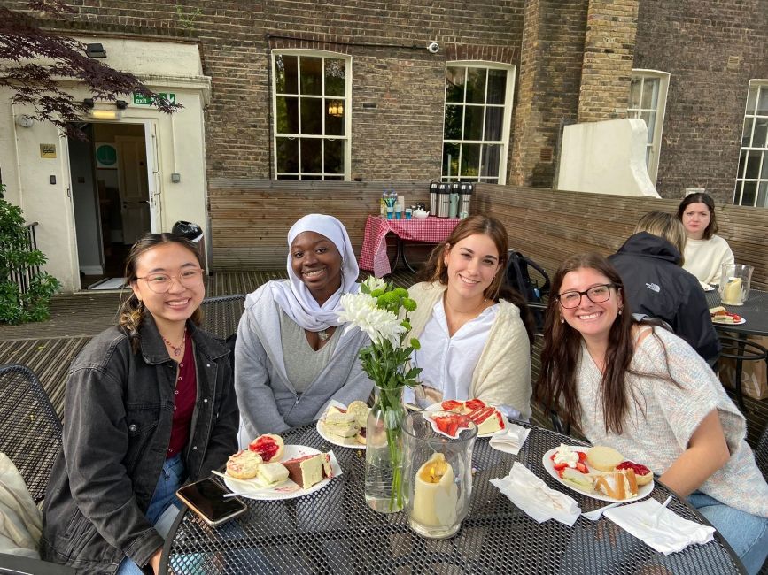 London girls eating breakfast outside
