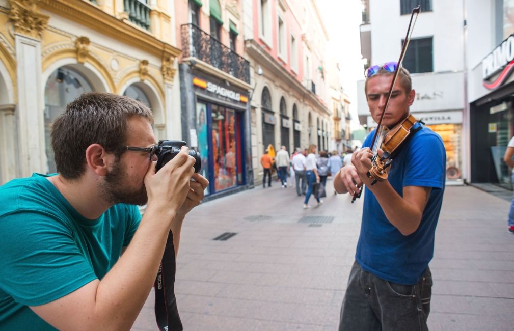 violinist abroad seville street performer