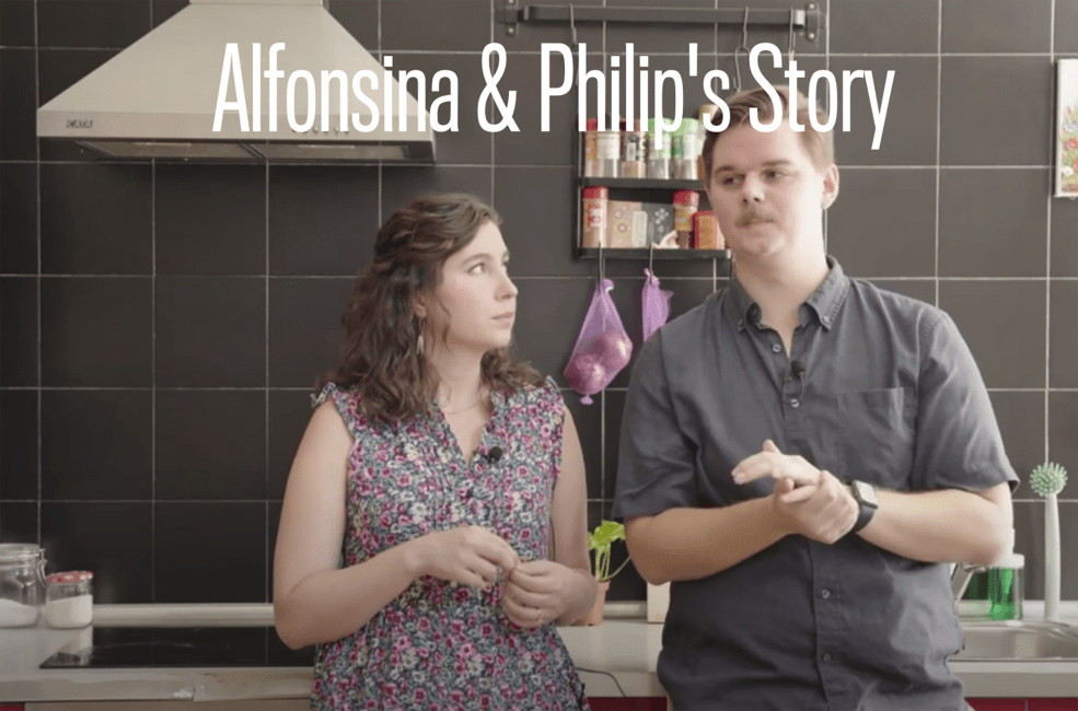 Couple giving interview in kitchen