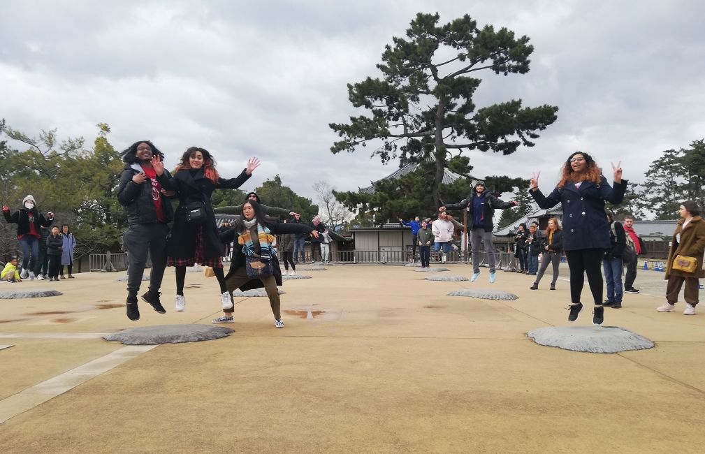 students jump air kyoto japan abroad