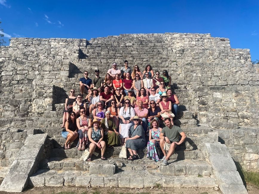 Group photo of program leaders in Merida on steps