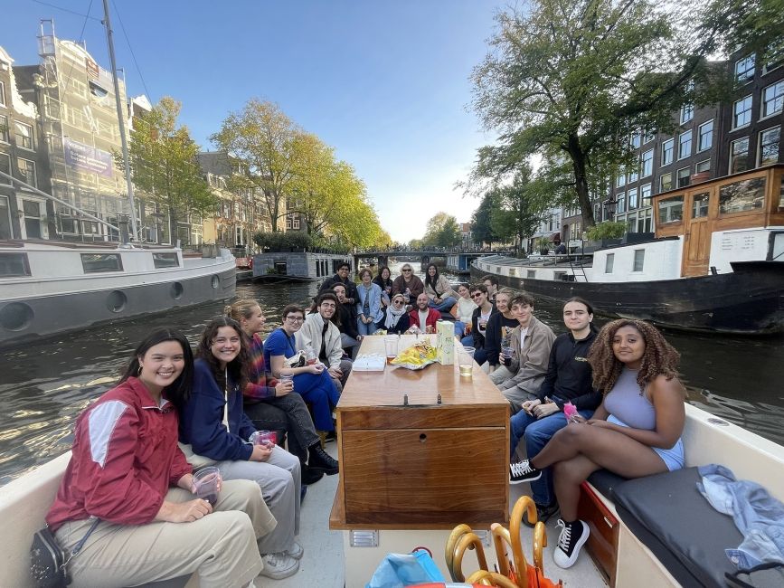 Students on a boat ride in Amsterdam