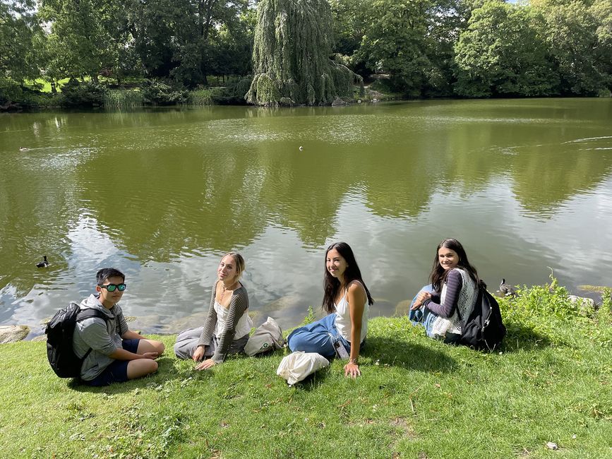 High schoolers relaxing by a lake in Copenhagen