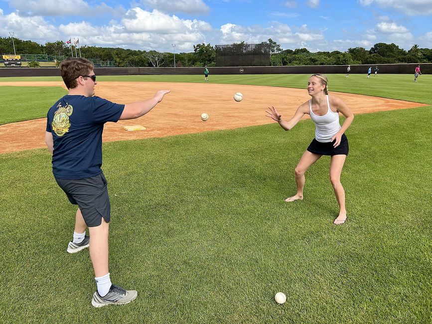 santiago dr students playing a baseball drill