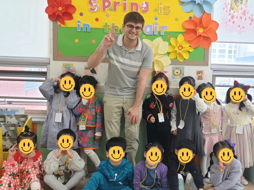 nick standing with students