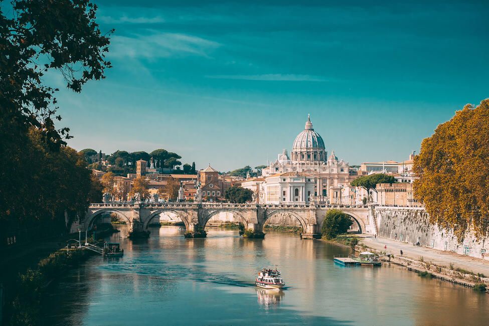 rome-river-bridge-boat-basilica