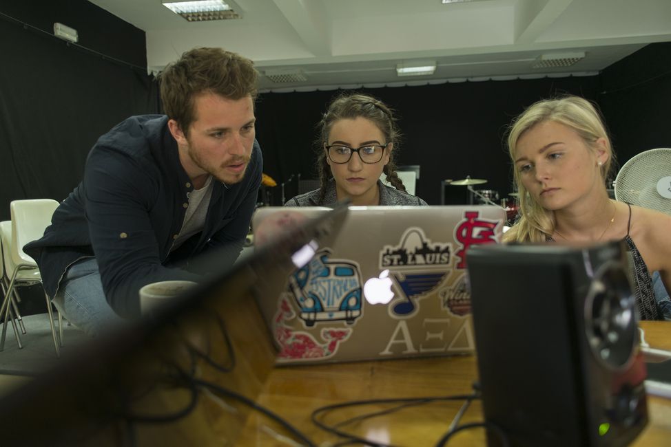 seville students laptop class abroad together