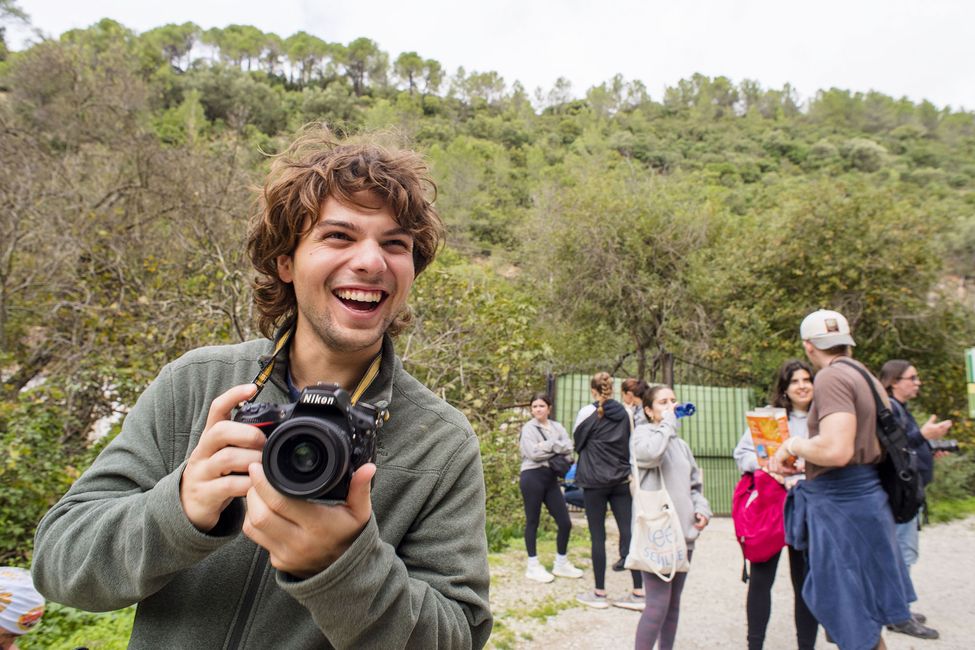 seville-smiling-guy-camera-hiking