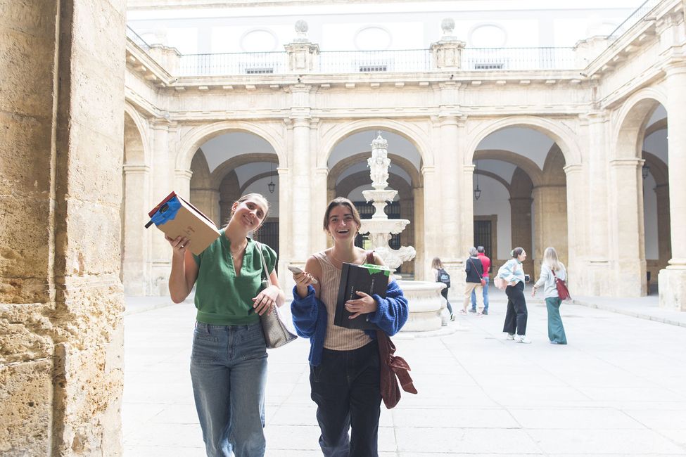 students-abroad-smiling-fountain-in-background